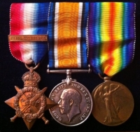 A RARE 1914 STAR & BAR CASUALTY TRIO & PLAQUE. (ROYAL WELSH FUSILIERS) & Brother