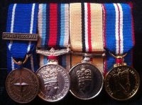 A Good NATO (Yugoslavia) O.S.M. 2000 (Afghanistan) IRAQ (Operation TELIC)  Golden Jubilee group of four. To: (C.8020215) Chief Technician A.P. ROBINS. R.A.F. (Served with 31 Squadron RAF, on Tornados) With miniatures.