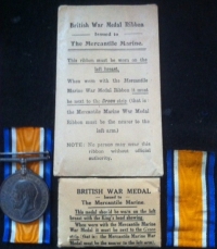 AN UNUSUALLY COMPLETE MERCANTILE MARINE & WAR MEDAL PAIR.To: WALTER HOWARD (50 Thornby Rd, Lower Clapton, London, E5) With all the original ribbon and medal issue envelopes, boxes and papers. 