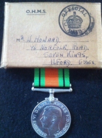 AN UNUSUALLY COMPLETE MERCANTILE MARINE & WAR MEDAL PAIR.To: WALTER HOWARD (50 Thornby Rd, Lower Clapton, London, E5) With all the original ribbon and medal issue envelopes, boxes and papers. 