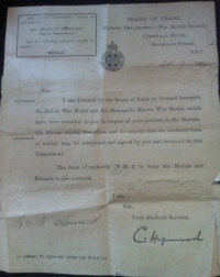 AN UNUSUALLY COMPLETE MERCANTILE MARINE & WAR MEDAL PAIR.To: WALTER HOWARD (50 Thornby Rd, Lower Clapton, London, E5) With all the original ribbon and medal issue envelopes, boxes and papers. 