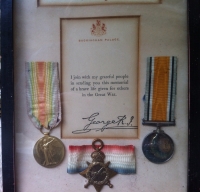 An  original 1914-15 Trio, Scroll & Condolence Slip.To: 17752 Pte Frederick Everitt PEARSON 2nd NORFOLK REGT. In original frame. Died of Wounds 24th February 1917. COMMEMORATED ON THEÂ BASRA MEMORIAL, IRAQ.(Panel 10)