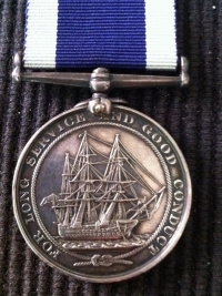 A PLEASING GROUP of THREE GEORGE V ROYAL NAVY LONG SERVICE & GOOD CONDUCT MEDALS.