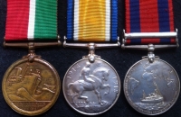 A SCARCE EDWARD VII TRANSPORT MEDAL (S,AFRICA 1902), WAR MEDAL & MERCANTILE MARINE MEDAL TRIO. To: Chief Officer JOHN ARMOUR. (MERCHANT NAVY). One of only 1219 medals.