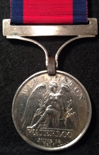 A VERY High Grade WATERLOO MEDAL. With a unique (18th JUNE 1815) silver suspender  & "10th RL HUSSARS" silver clasp. Both Contemporary.(An Early Re-Name, Thus An Attractive Display Item) 