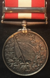 A CANADA GENERAL SERVICE MEDAL. (FENIAN RAID 1866) 
Pte R.J. BRADLEY. 8th Bn (Stadacona Rifles, No1 Coy)
(On original ribbon with copy medal roll) 