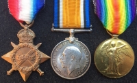 A Unique & Exceptionally Complete, East & West Africa (BENIN 1897) & 1914-15 Trio, 1911 Coronation Medal & LSGC (GV) Plaque & Scroll, Royal Navy Group of Six. With a uniformed photo of the recipient wearing his Africa medal.
