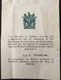 A VERY RARE "FULLY ATTRIBUTED" SOUTHERN RHODESIA WAR MEDAL. 1939-1945. WITH ISSUE SLIP & ORIGINAL ADDRESSED REGISTERED ENVELOPE 
