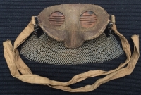 A SUPERB & VERY RARE WORLD WAR ONE "TANK SPLINTER MASK"In wonderful condition. All fully correct & totally original with the all important W /| D stamp to the khaki tie tapes. 
