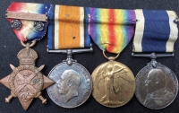 A SCARCE & DESIRABLE “ROYAL MARINE BRIGADE” 1914 Star & Bar Trio & Edward VII LSGC. Served Dunkirk & Defence of Antwerp, 19th Sept-12th Oct 1914 & at Gallipoli 1915. Wounded May 1917 & invalided. 

