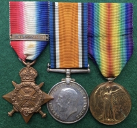 A Superb & Complete “Old Contemptible’s” 1914 Star & Bar Trio 
(Seriously Wounded, Somme) Silver War Badge, No.36835, Cap Badge & Four Collar Dogs. Photo & Full Papers To: 7044. Pte Frank  LUTY. 1st / 2nd Bn Scots Guards. 