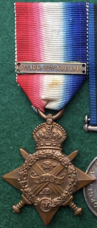 A Superb & Complete “Old Contemptible’s” 1914 Star & Bar Trio 
(Seriously Wounded, Somme) Silver War Badge, No.36835, Cap Badge & Four Collar Dogs. Photo & Full Papers To: 7044. Pte Frank  LUTY. 1st / 2nd Bn Scots Guards. 