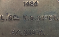 A Rare & Desirable 1914 Star & Bar Trio Casualty with Plaque.To: 1484, L/Cpl Walter Oswald Orpet. 9th London Regt (Queen Victoria’s Rifles) Killed-In-Action 25th Oct 1915. (A Late Loos Casualty) FROM HIGHBURY, LONDON.