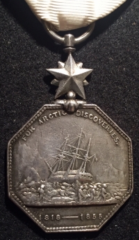 A RARE & VERY ATTRACTIVE “ARCTIC MEDAL” (1857) 
Always greatly sought after by type collectors & exploration enthusiasts. Spanning the early North Pole period of 1818-1855. With the Famous White Ribbon.