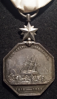 A RARE & VERY ATTRACTIVE “ARCTIC MEDAL” (1857) 
Always greatly sought after by type collectors & exploration enthusiasts. Spanning the early North Pole period of 1818-1855. With the Famous White Ribbon.