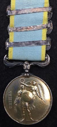 A Rare “French” British Crimea Medal. With Three “French” Clasps (ALMA)-(BALAKLAVA)-(INKERMANN) of unusual design. To: ANTOINE PRAYER. G. IMP TRAIN (Served with The Grand Imperial Wagon Train of Napoleon III)