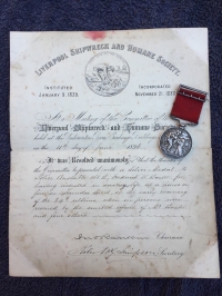 AN EXCEPTIONALLY WELL DOCUMENTED & EARLY  “LIVERPOOL SHIPWRECK & HUMANE SOCIETY’S FIRE MEDAL”. To: P.C. 158B. Fred W. Baxter, Rescued 3 Children From House On Fire in Lowndes St, L’Pool. 24th May 1896.