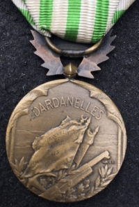 A RARE & DESIRABLE FOREIGN AWARD of  DISTINGUISHING SERVICE MEDAL” To: FRENCH “Brevete” RENAUD GABIER. Crewman in French Battleship “CHARLEMAGNE” For Gallantry, Dardanelles on 18th March 1915.