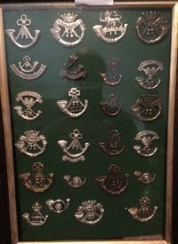 MAJOR & HIGHLY DESIRABLE EARLY BRITISH MILITARY BADGE COLLECTION of OVER  400 EXCELLENT AND RARE HELMET PLATES & HAT BADGES. A TRULY SUPERB ASSEMBLY of OVER 400 PIECES.