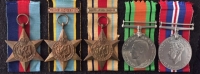 A VERY RARE & ATTRACTIVE “Anonymous” (MINT STATE)
DISTINGUISHED FLYING CROSS (1945) Aircrew Europe, (France & Germany), Africa Star (North Africa 1942) group of five. With Original Case.