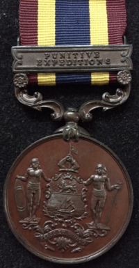 A Totally Exceptional & Very Rare BRITISH NORTH BORNEO COMPANY MEDAL. Clasp. “PUNITIVE EXPEDITIONS”  MINT STATE & “PROOFLIKE BRONZE”