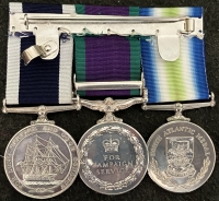 A SCARCE & ATTRACTIVE SOUTH ATLANTIC (Falklands War) MEDAL (With Rosette) CAMPAIGN SERVICE MEDAL (QEII), scarce “GULF” clasp for Iran & Iraq & Long Service Good Conduct Medal (Royal Navy) A Frigate Sailor.