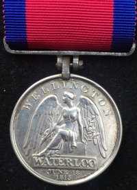 A Truly Magnificent & rare “Heavy Cavalry Charger” WATERLOO MEDAL To: Christopher Armstrong, 6th or Inniskilling Dragoons. Severely wounded in the famous “Great Union Charge” Lost left leg when 6th rode with Scots Greys.