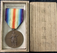 A VERY RARE “JAPANESE” ALLIED VICTORY MEDAL IN “TOTALLY MINT STATE” (In original wooden case)  with original ribbon and pin.